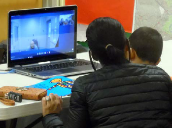 Family meeting together online from the Free Library of Philadelphia.