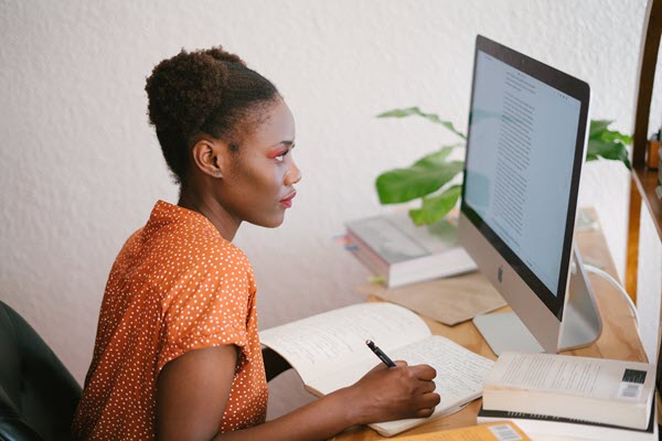 woman at computer learning