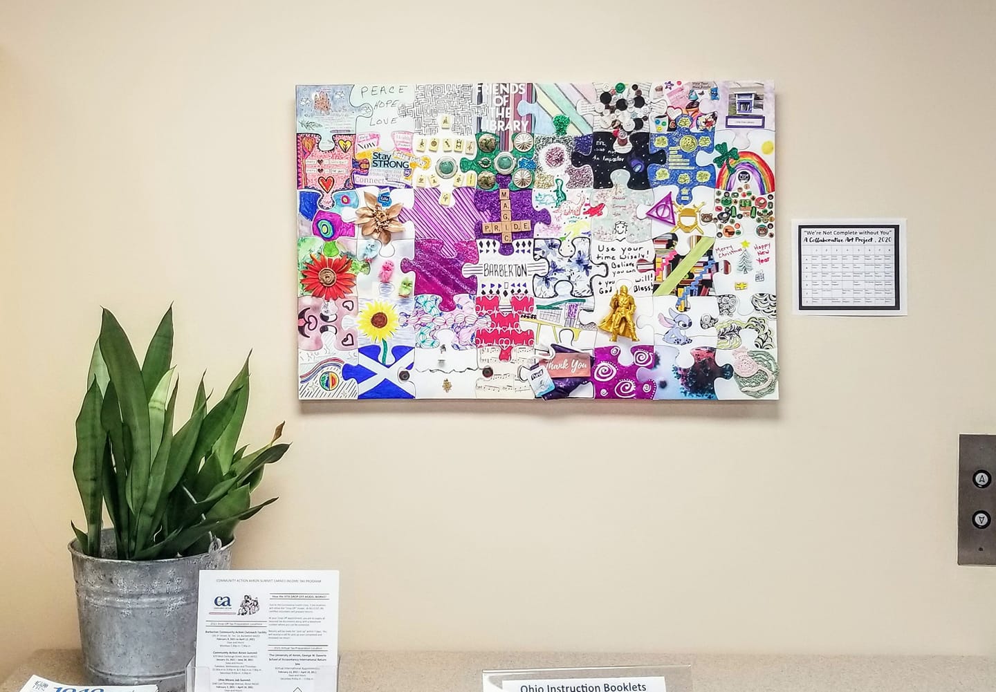 large decorated puzzle mounted on wall