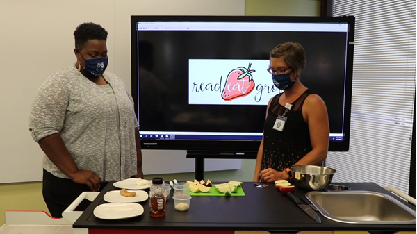 two people presenting cooking demonstration