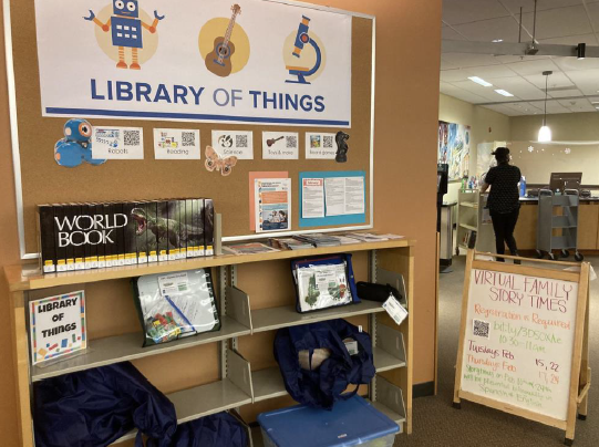 Library of Things bulletin board and display shelf