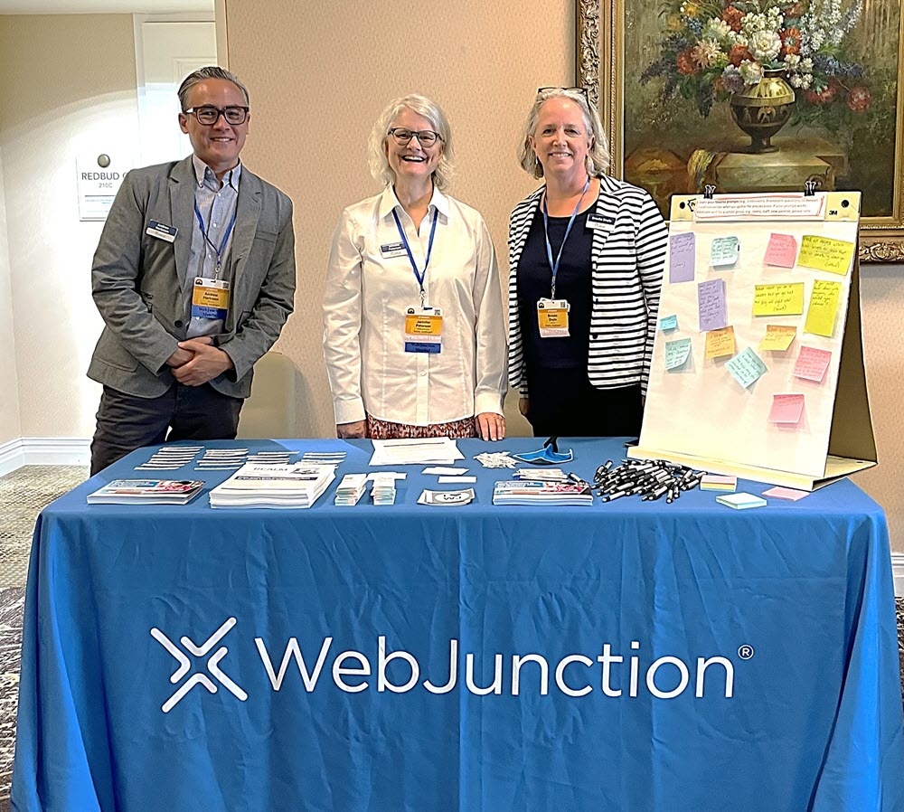 WebJunction team at info table at ARSL 