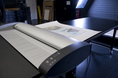 Photo of a map being scanned.