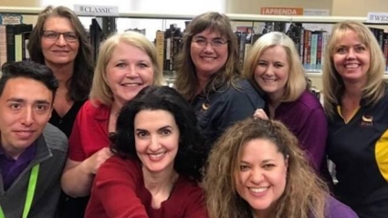 Photo of 8 library staff members. Photo of 8 library staff members.