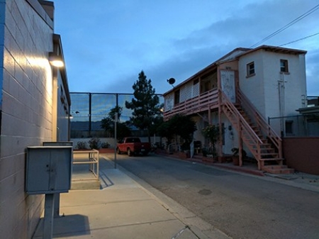 Photo of fence on Mexican-American border in historic Chihuahuita neighborhood of El Paso, Texas