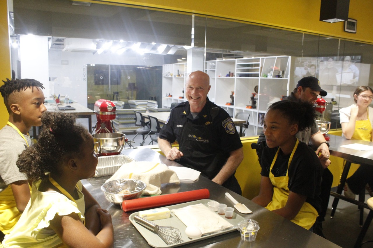 Carroll-Library-baking-with-badge