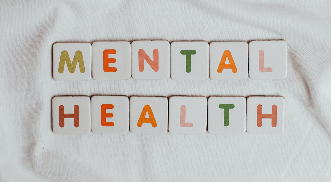 multi-colored letter tiles that spell out ‘mental health’