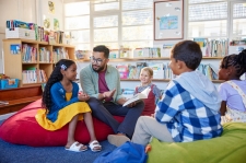 Librarian reads with children