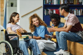 Librarian casually talking to teens