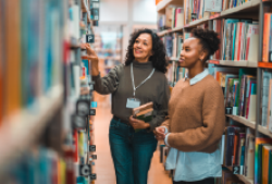 Librarian interacting with teens
