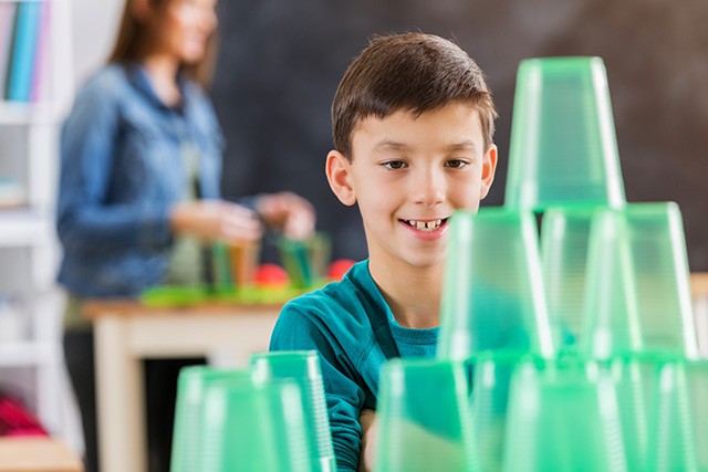 Child participating in passive programming activity